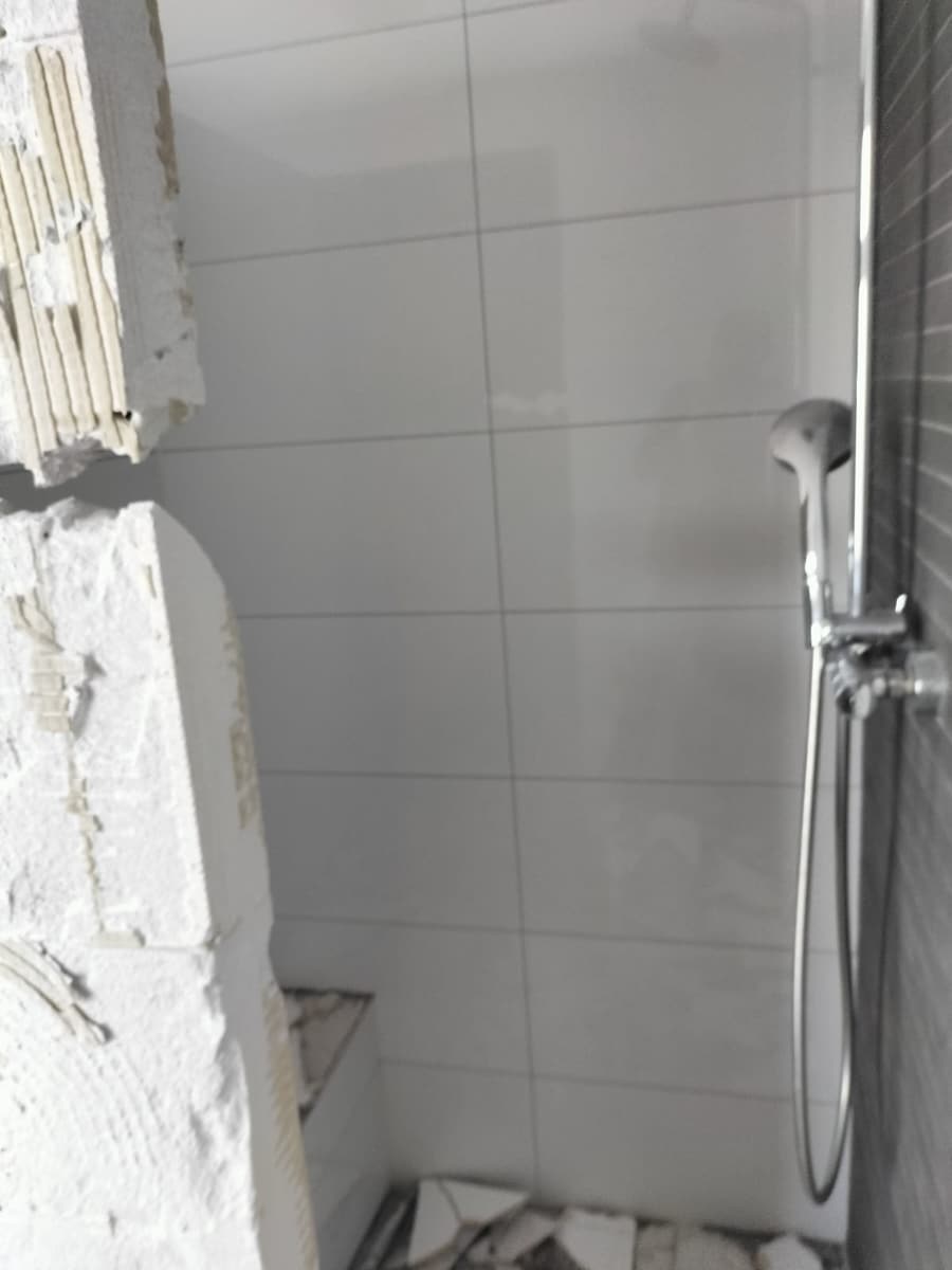 Sloopwerk rond de oude douchehoek